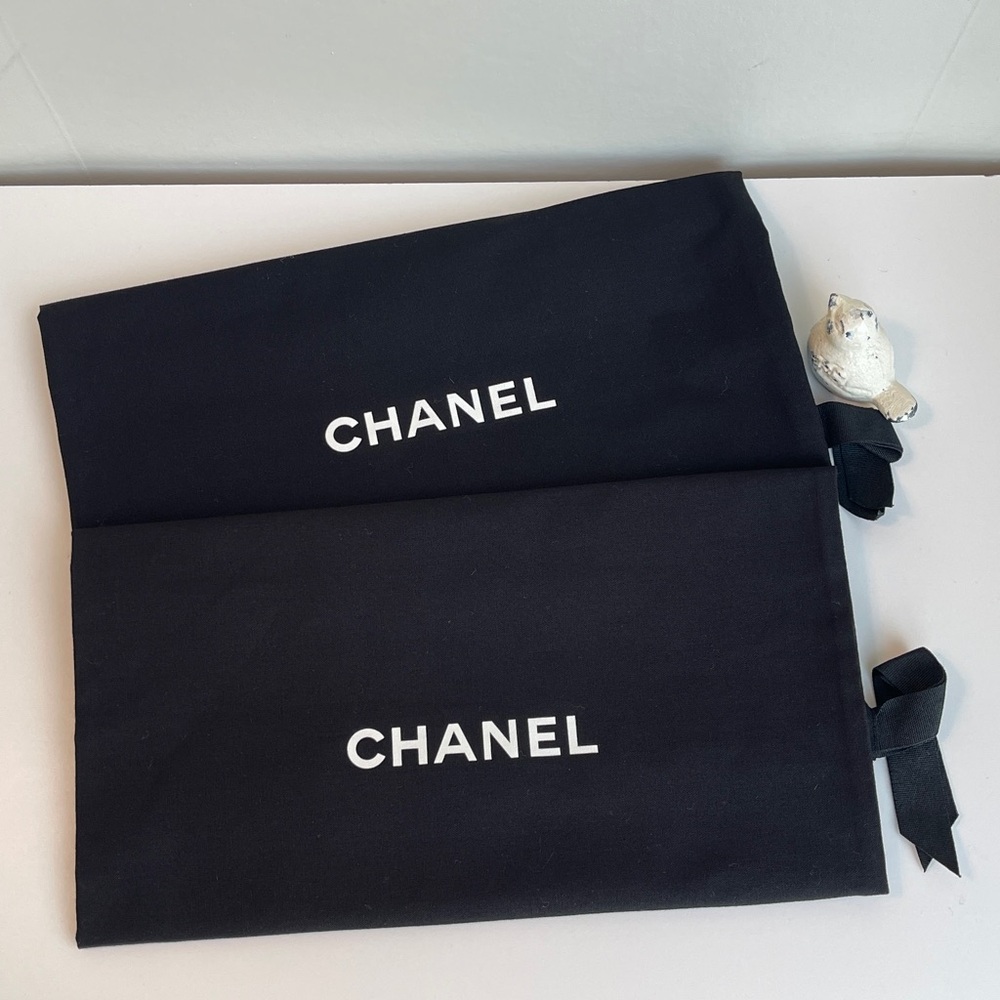 Pair Of Chanel Dust Bags